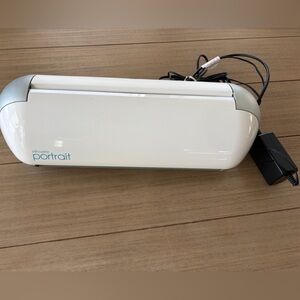 Silhouette Portrait Crafting Tool in White and Gray